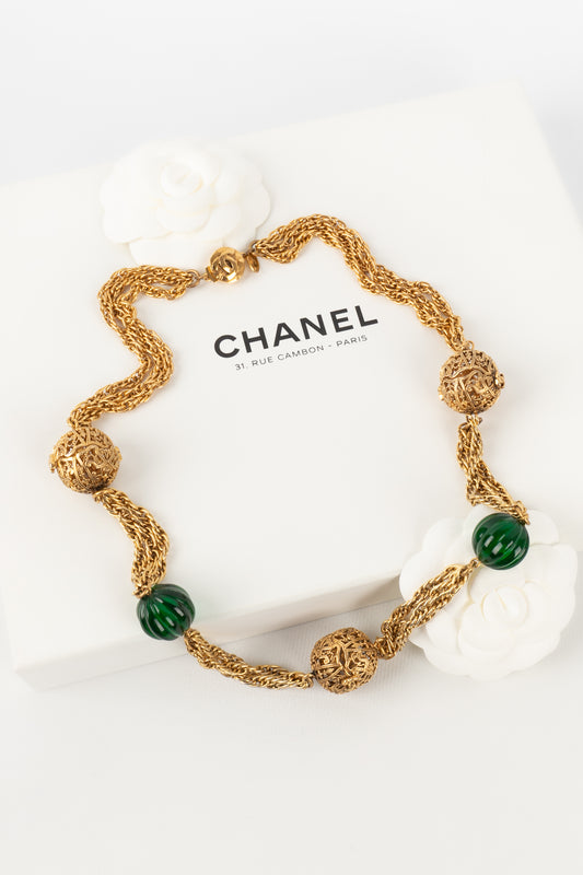 Collier doré Chanel 1984