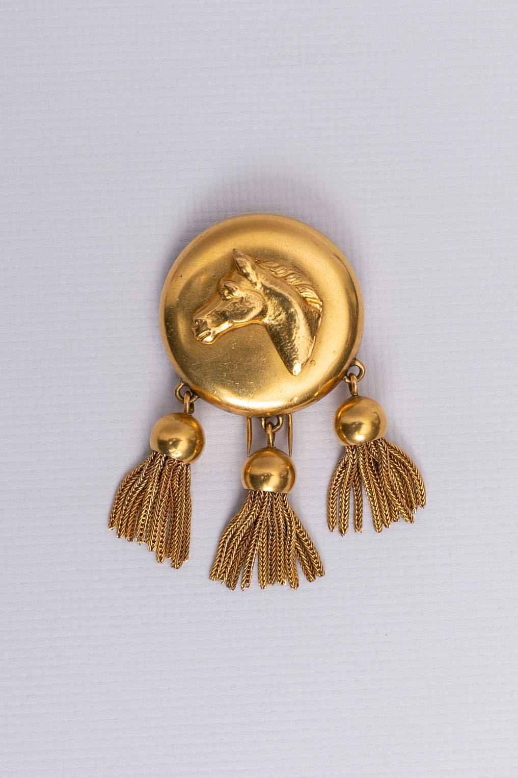 Broche "cheval" en métal doré