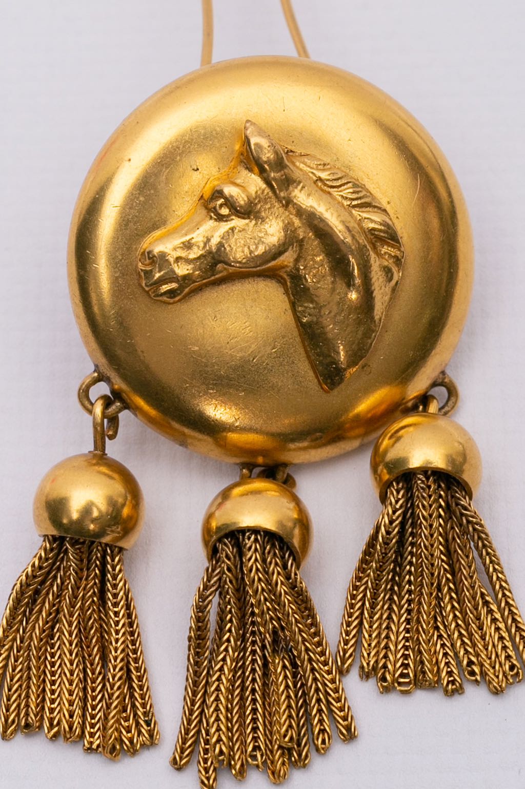 Broche "cheval" en métal doré