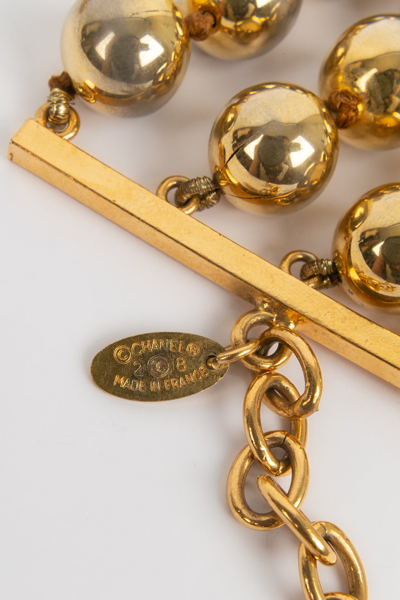 Bracelet de perles dorées Chanel