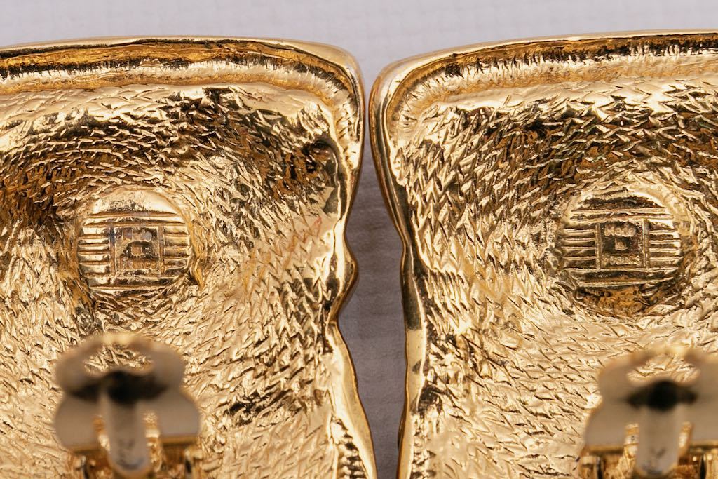 Boucles d'oreilles dorées Yves Saint Laurent