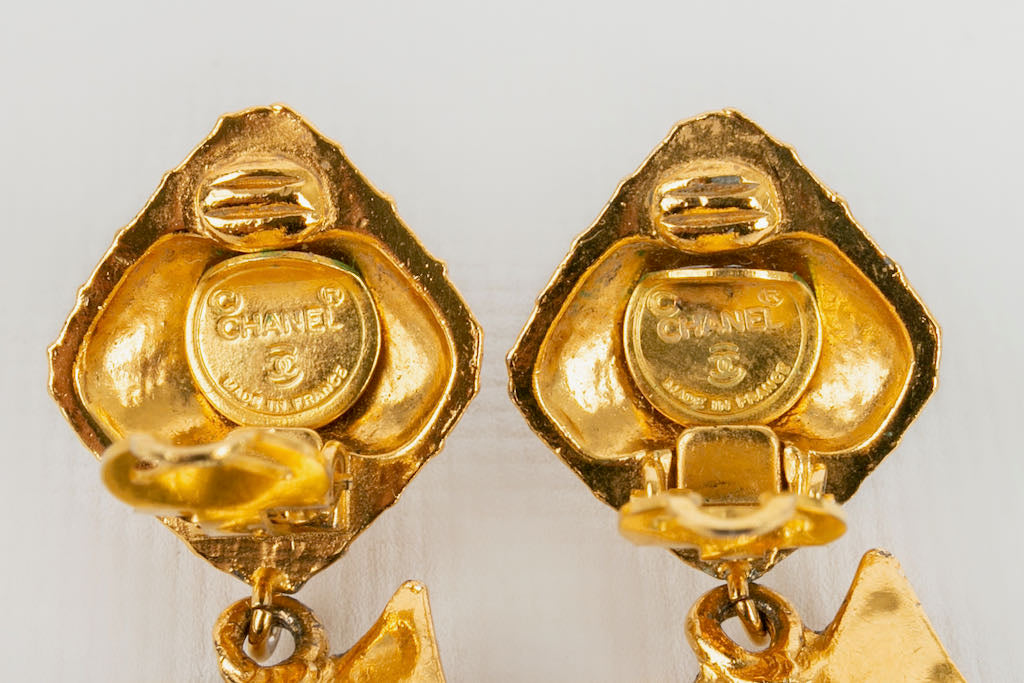 Boucles d'oreilles dorées Chanel 