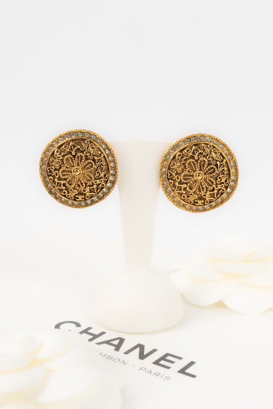 Boucles d'oreilles dorées Chanel