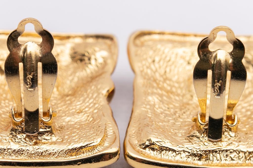 Boucles d'oreilles dorées Yves Saint Laurent