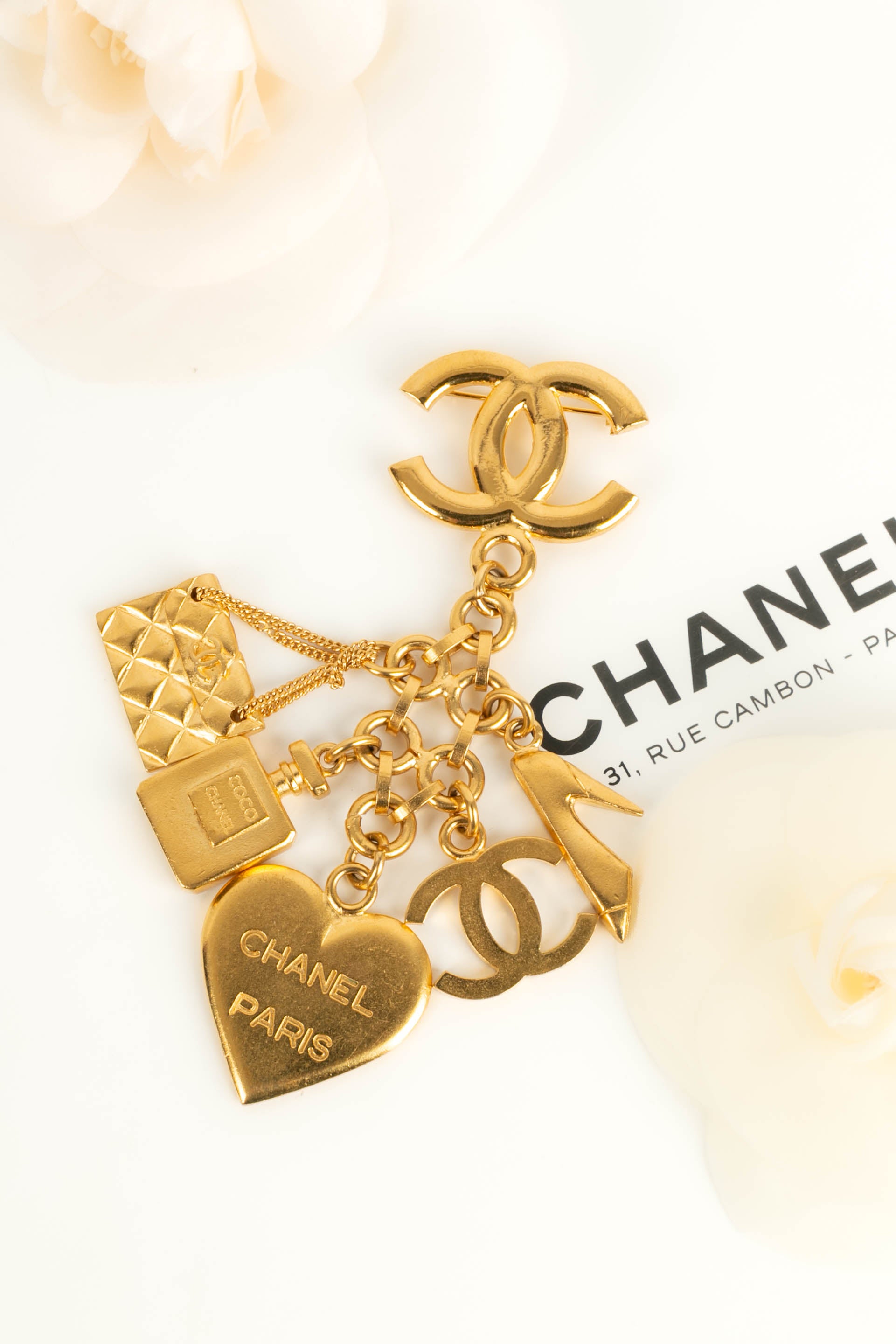 Broche charms Chanel 1995