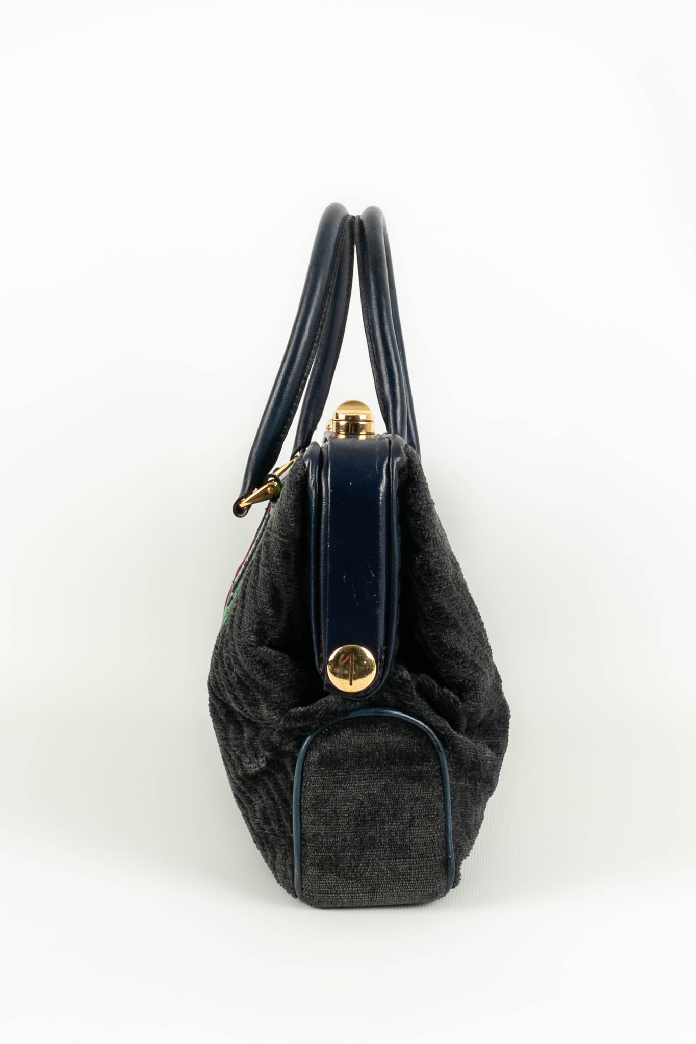 Sac en velours et cuir