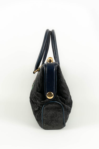 Sac en velours et cuir