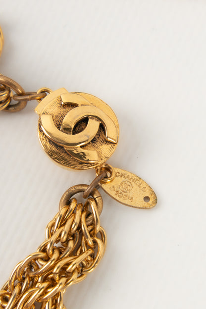 Collier doré Chanel 1984